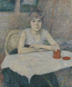 Jonge vrouw aan een tafel, 