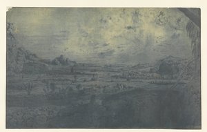 Bergvallei met omheinde velden