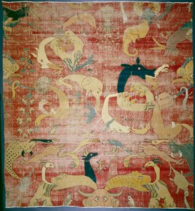 Deel van een tapijt met fantastische dieren op rode ondergrond, Mughal, c.1580-85 door Indian School