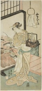 De acteur Yamashita Kinsaku II als Oume, vrouw van Kisaku, in het stuk Nue no Mori Ichiyo no Mato, uitgevoerd in het Nakamura Theater in de elfde maand, 1770
