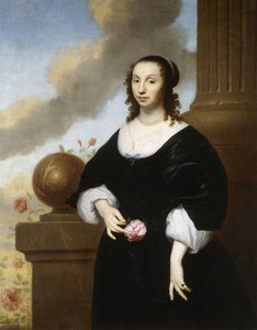Portret van een dame, staand driekwart lengte, gekleed in een zwarte satijnen jurk met witte kanten afwerking