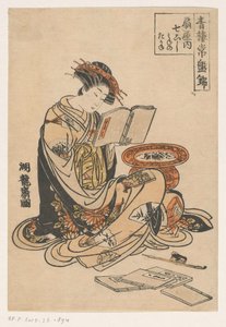 Lezende vrouw door Isoda Koryusai