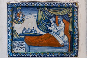 Madonna met kind en biddende echtparen, ex-voto plaquette
