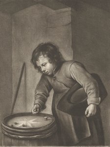 Jongen die knikkers speelt
