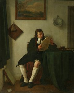 Interieur met een man die leest