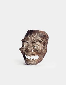 Een houten Gigaku masker