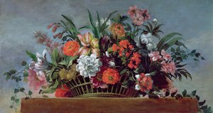 Gevlochten mand gevuld met bloemen