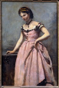 Jong meisje met roze jurk