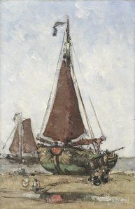 Vissersboot met stompe boeg op het strand