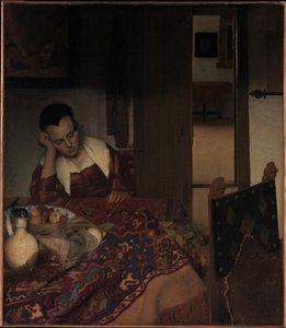 Ein schlafendes Mädchen door Johannes Vermeer