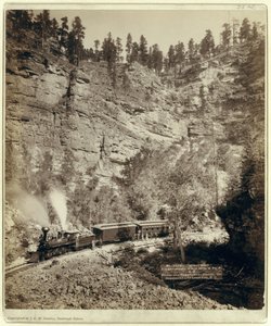Trein door Elk Canyon door John C. H. Grabill