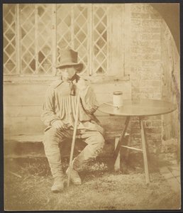 [Man zittend aan tafel] door John Whistler