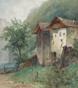 Huizen aan een bergmeer