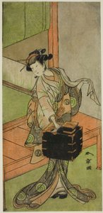 De acteur Yamashita Kinsaku II als Miyagino vermomd als kapper in het stuk Kosode-gura no Tekubari, uitgevoerd in het Morita Theater in de tweede maand, 1772 (?)