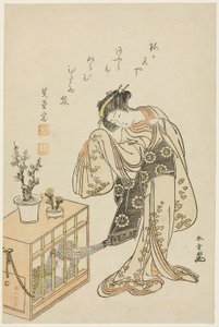 Jonge vrouw met gekooide aap (Kalenderprent voor Nieuwjaar 1776) door Katsukawa Shunsho