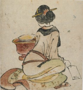 Zittende figuur van een vrouw