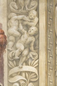 Putti, decoraties rond de ramen