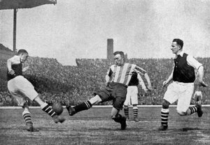 Actie uit een Arsenal v Sheffield United voetbalwedstrijd