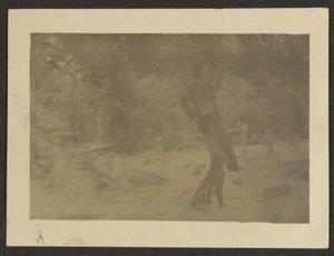 [Jonge man met hond in het veld]. door Louis Fleckenstein