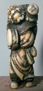 Japanse Netsuke van een Chinese danser en kind, 18e eeuw door Masahira