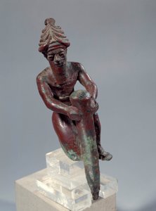 Mesopotamië: koperen funderingsfiguur die de god toont die een spijker duwt