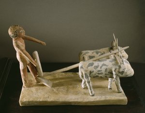 Grafmodel van een ploeger die zijn ploeg leidt getrokken door twee ossen