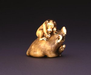 Netsuke, een zwijn met een aap, c.1800-10