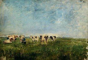 Koeien in een weiland worden gemolken