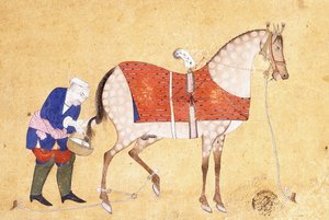 Een stalknecht met een paard