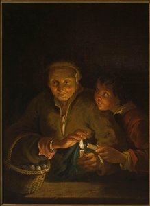 Oude vrouw en jongen met een kaars