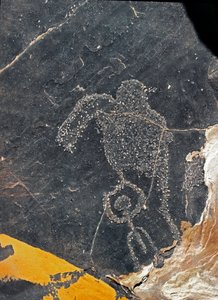 Prehistorie, rotstekeningen: een grafrots van een menselijke figuur. Steentijd 5000-2000 v.Chr. Taghit, Haut plateau du Hoggar (Ahaggar), Algerije
