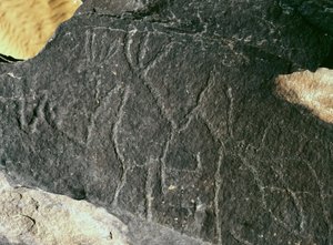 Prehistorie, rotstekeningen: grafrots. Steentijd 5000-2000 v.Chr. Taghit, Hoog plateau van de Hoggar (Ahaggar), Algerije