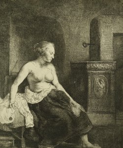 Een Vrouw Halfgekleed Zittend naast een Kachel, 1658 door Rembrandt van Rijn