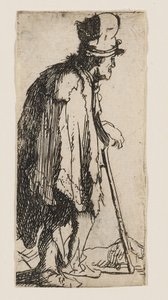 Bedelaar met een verlamde hand, leunend op een stok door Rembrandt van Rijn