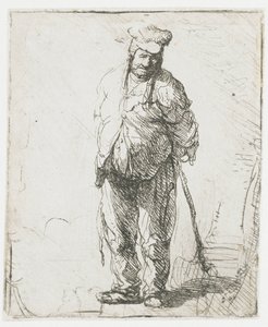 Een haveloze boer met zijn handen achter zijn rug, die een stok vasthoudt door Rembrandt van Rijn