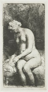 Vrouw die haar voeten baadt in een beek door Rembrandt van Rijn