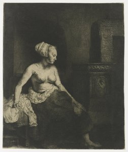 Vrouw half aangekleed naast een kachel door Rembrandt van Rijn