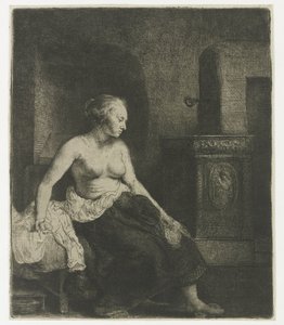 Vrouw zittend half aangekleed naast een kachel door Rembrandt van Rijn