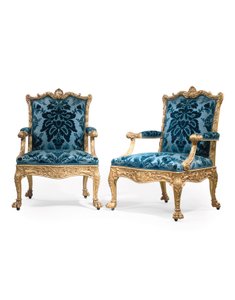 Een paar George III vergulde houten armstoelen door Robert Adam