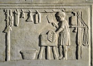 Romeinse kunst: een slager in zijn winkel Bas-reliëf, Romeinse beschaving, 2e eeuw n.Chr., Rome, Museum van de Romeinse Beschaving - Slager aan het werk in zijn winkel - Steenreliëf, 2e eeuw n.Chr. - Rome, Museum van de Romeinse Beschaving