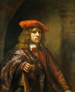 Portret van een jonge man met een rode pet