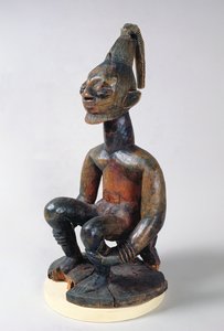 Yoruba-beeld van een zittende chef, Nigeria