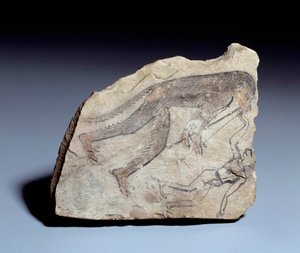Egyptische oudheid: ostrakon met aap die dubbele fluit speelt