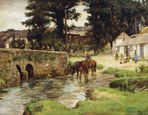 De paarden water geven in de dorpsbeek