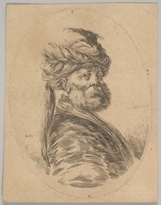 Een Turkse man met een baard en tulband met een lange veer aan de voorkant