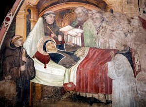 De dood van Sint Scholastica (ca. 480- ca. 543), zus van Sint Benedictus van Nursia. Ze is omringd door Benedictijnse monniken. Fresco van de Umbrische school uit de 15e eeuw. Klooster van Sint Benedetto (Sacro Speco), Subiaco (Rome), Italië
