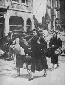 Britse troepen houden stand in Leuven terwijl vluchtelingen de stad verlaten, 1940