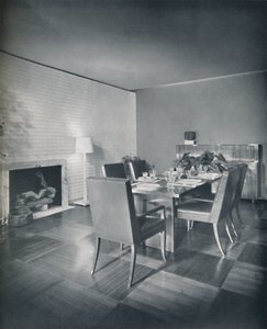 Eetkamermeubilair met leren stoelen ontworpen door T. H. Robsjohn-Gibbings door Unbekannt
