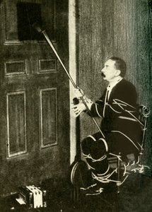 John Nevil Maskelyne voert een spirit cabinet illusie uit, ca. 1910 door Unbekannt