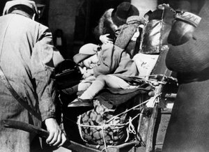 Vluchtelingen met hun bagage op het Gare de l